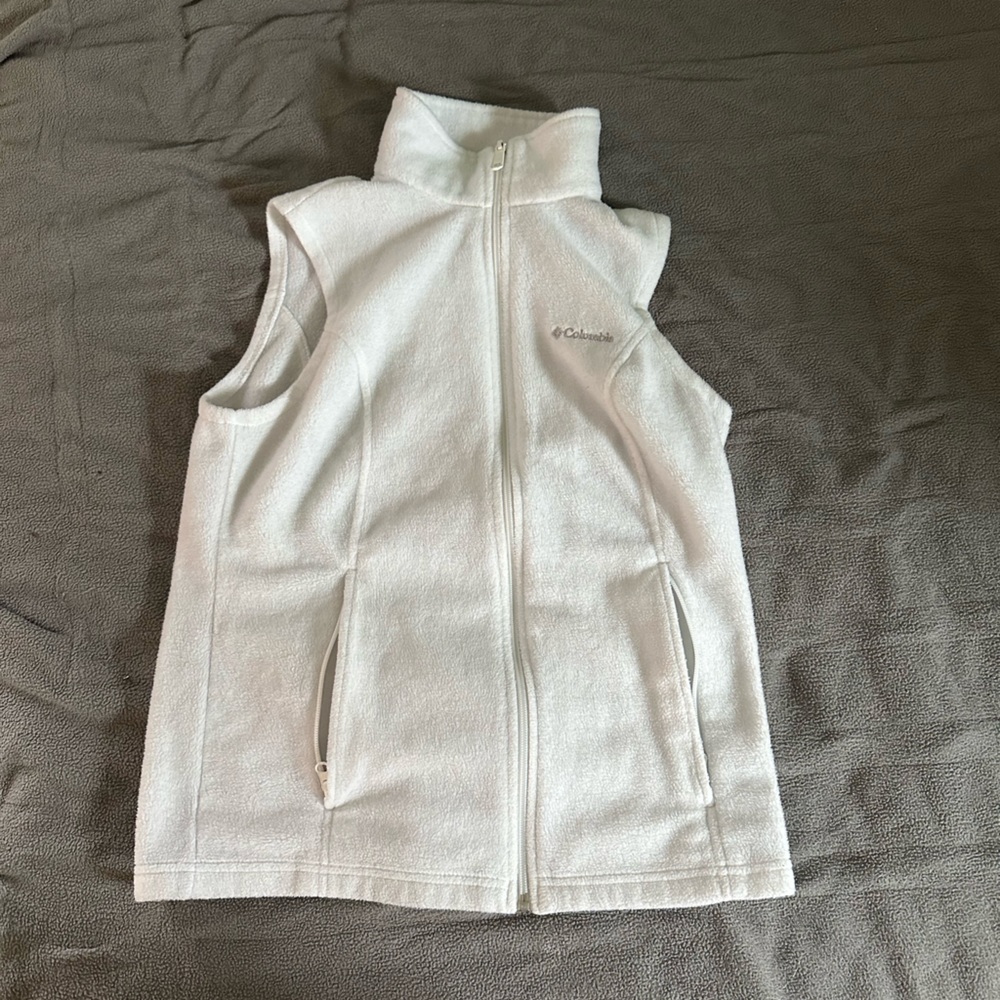 Size small white vest, fuzzy from Columbia.